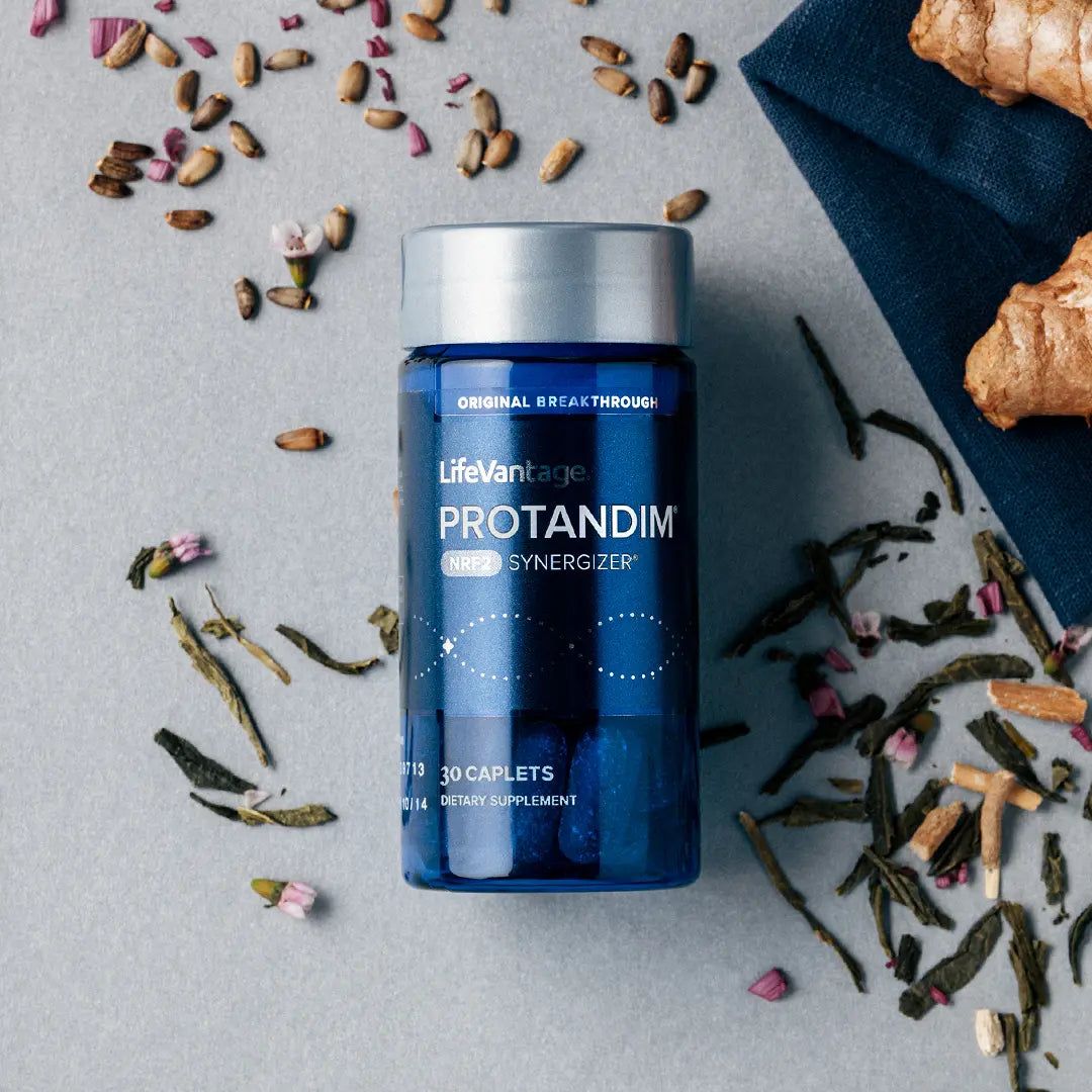 LifeVantage Protandim NRF2 supplement bottle with herbal ingredients clean minimal background